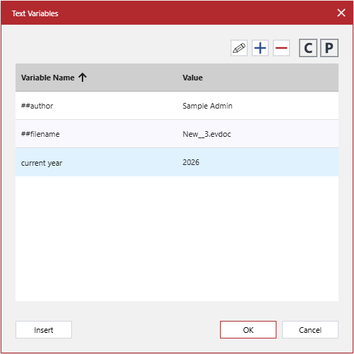 The inactive year text variable row displays new values while being selected in the Text Variables pop-up dialog